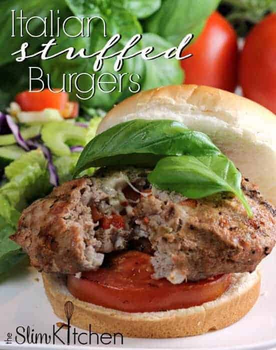 Italian Stuffed Turkey Burgers stuffed with cheese, pancetta and seasoning topped with grilled tomatoes and fresh basil