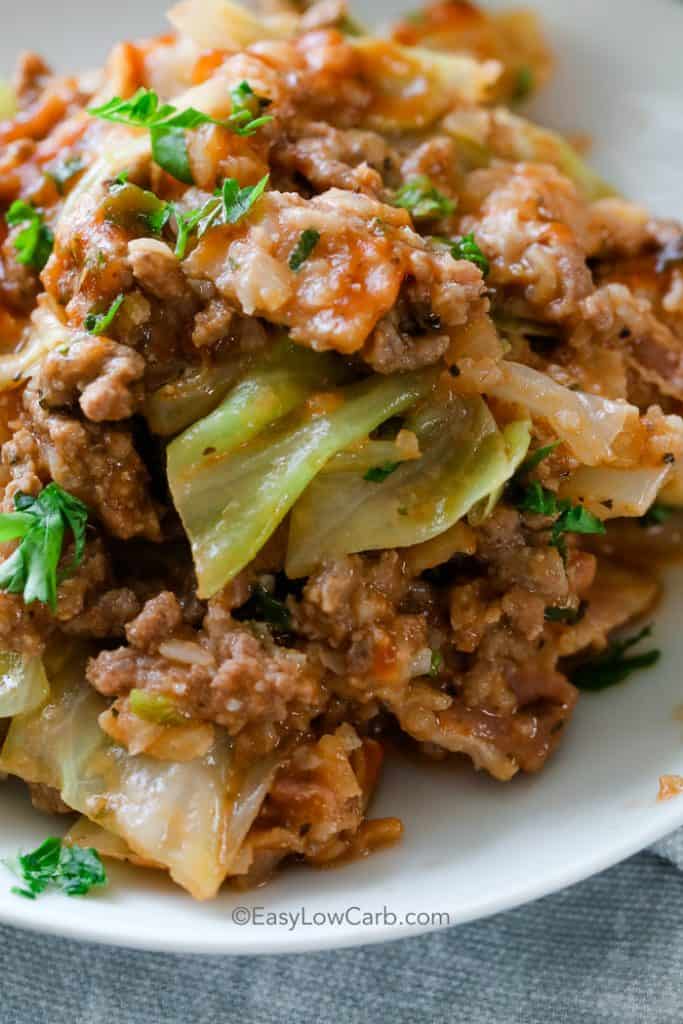 Low Carb Pork and Cabbage Skillet garnished with fresh parsley