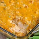 baked Buffalo Chicken Dip with a scoop out of it