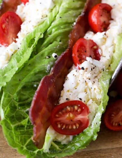 BLT Egg Salad Wraps topped with bacon and tomatoes