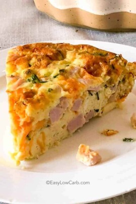 Crustless Ham and Cheese Quiche served on a white plate