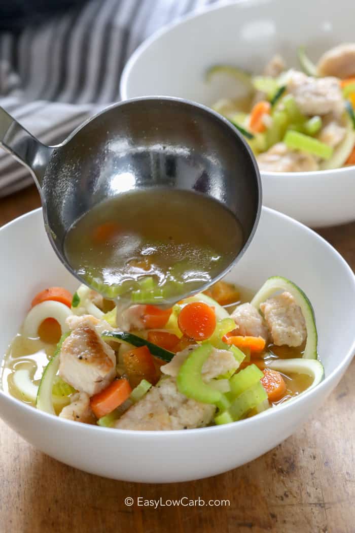 ladling Chicken Soup into a bowl