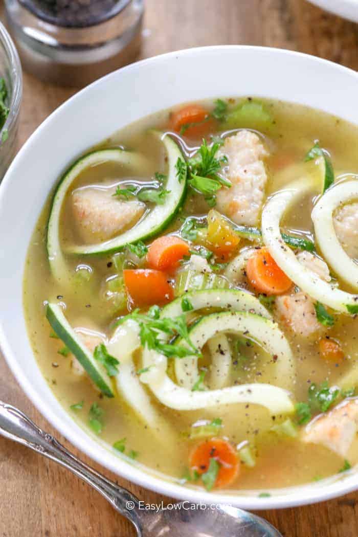 a bowl of low carb chicken soup with zoodles