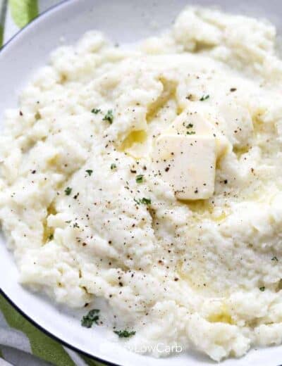 Mashed Cauliflower with butter in a white bowl