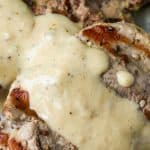 Pork Tenderloin with Creamy Dijon Sauce is a quick and easy low carb recipe. Pork tenderloin is pounded into medallions, grilled to tender perfection then topped with a creamy dijon sauce