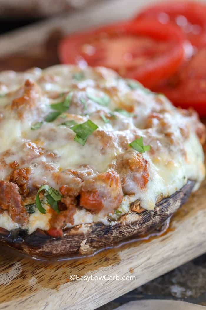 Lasagna Stuffed Mushroom closeup on a wood board