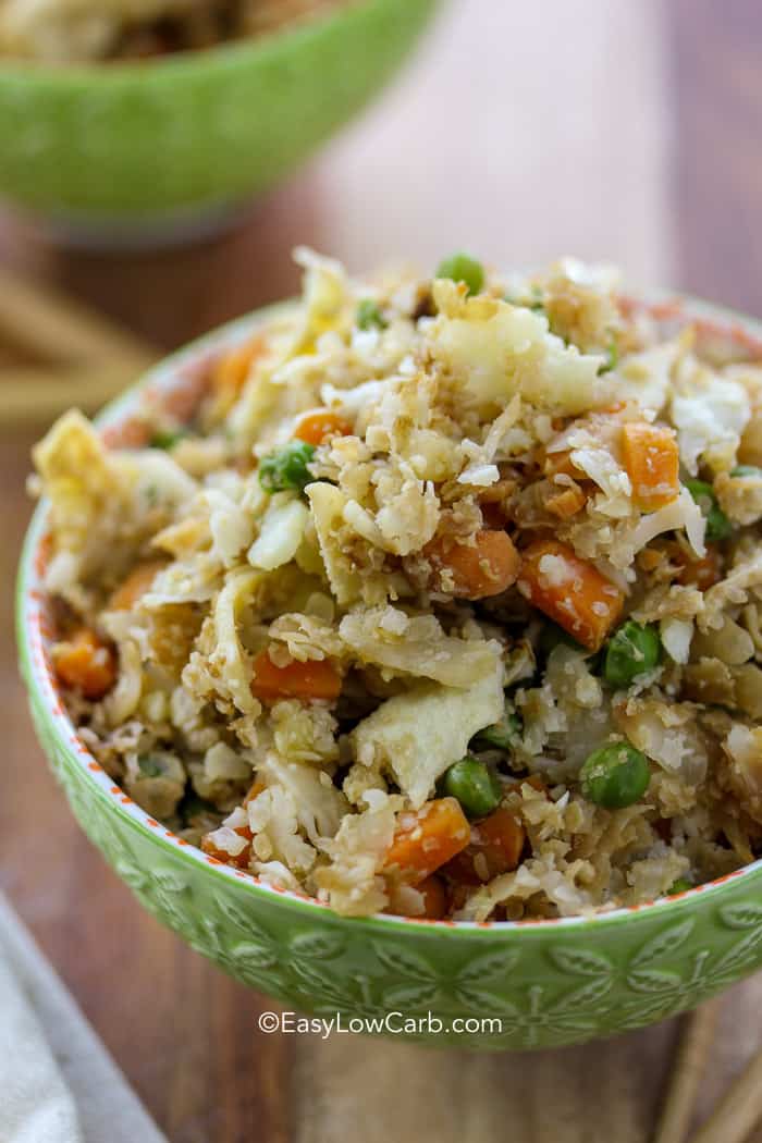 closeup of Low Carb Cauliflower Fried Rice in a green bowl