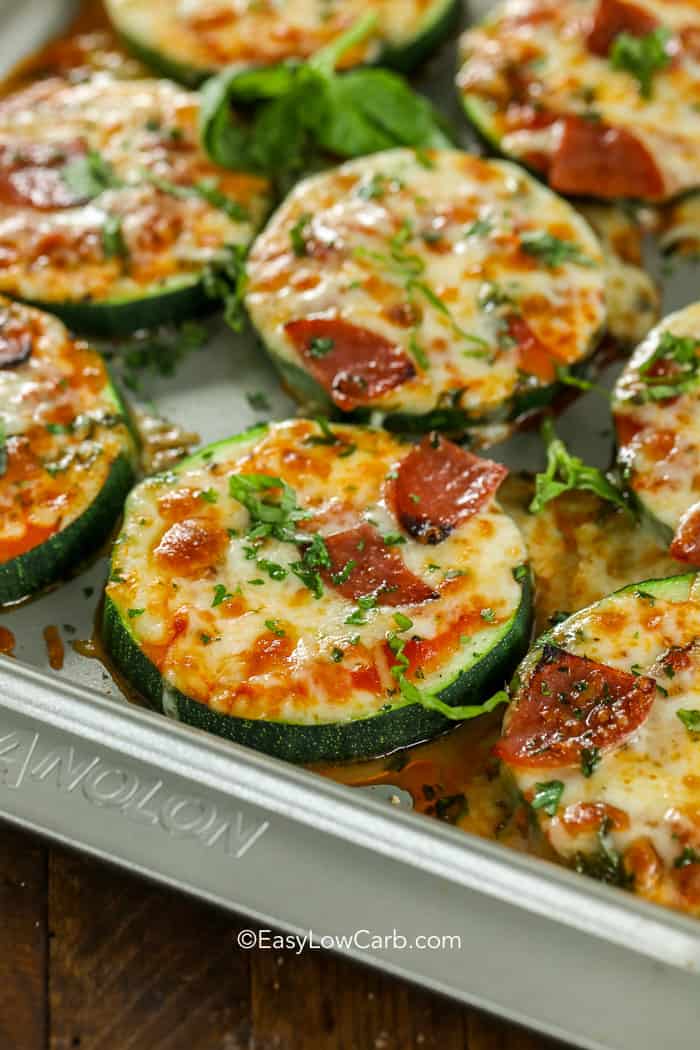 closeup of Low Carb Zucchini Pizza Bites on a baking tray