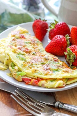 Denver Omlette on a plate with strawberries