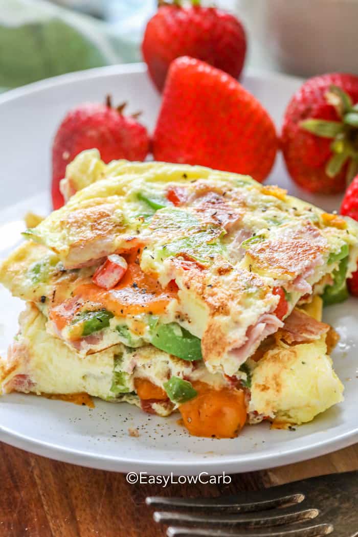 side view of Denver Omlette on a plate with strawberries