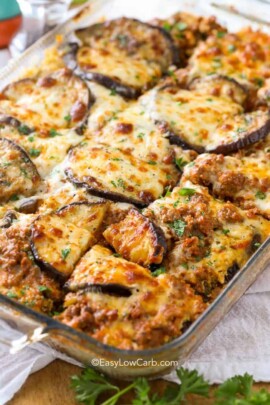 A clear baking dish with cooked Keto Eggplant Lasagna