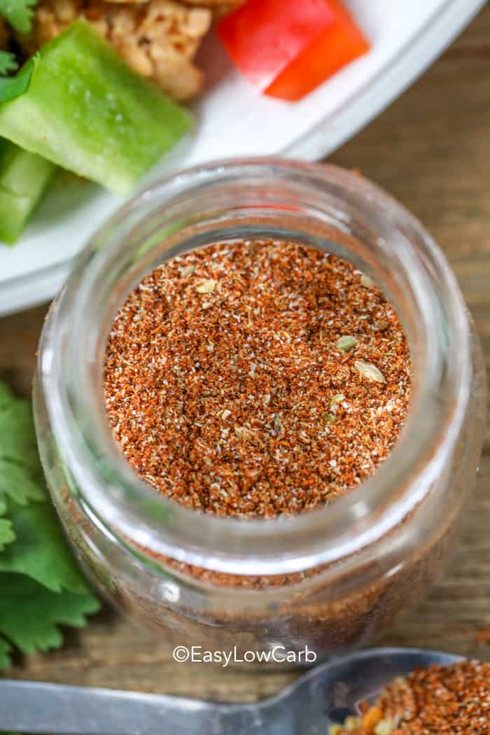 overhead of Taco Seasoning in a small glass jar