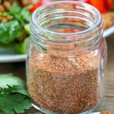 side view of Taco Seasoning in a small glass jar