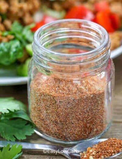 side view of Taco Seasoning in a small glass jar