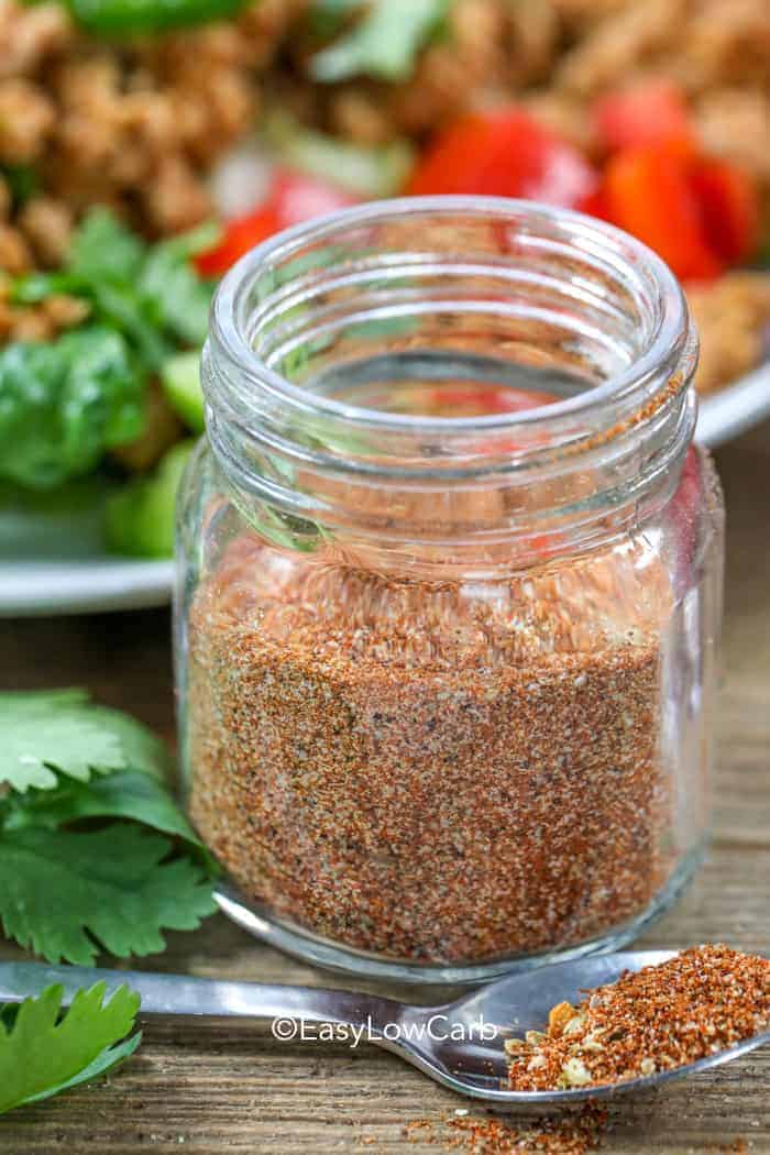 side view of Taco Seasoning in a small glass jar