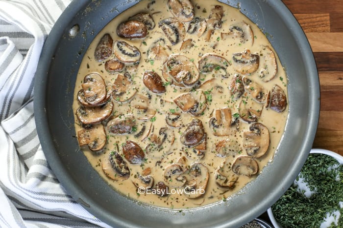 overhead of Dijon Mushroom Cream Sauce in a skillet