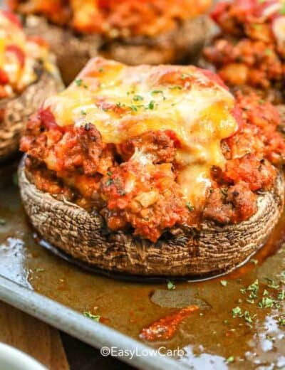Stuffed Portobello Mushroom Caps with melted cheese on the top