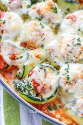 closeup of baked Zucchini Lasagna Roll Ups with melted cheese