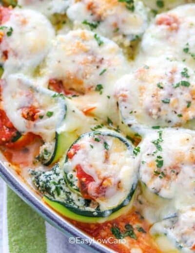 closeup of baked Zucchini Lasagna Roll Ups with melted cheese