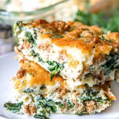 a slice of Spinach Cheese Egg Bake on a white plate