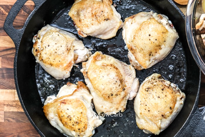 cooking Lemon Rosemary Chicken in a skillet