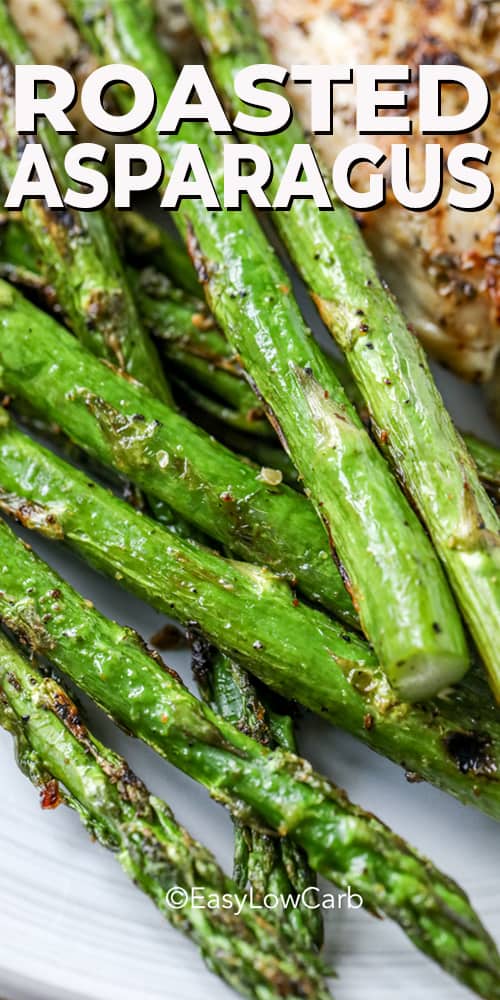 closeup of roasted asparagus on a white plate