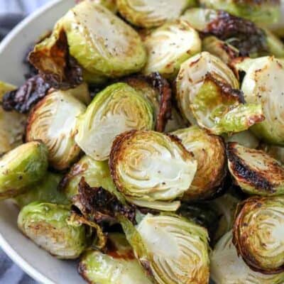 Air Fryer Brussel Sprouts in a white serving bowl