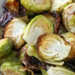 close up of Air Fryer Brussel Sprouts in a white serving dish