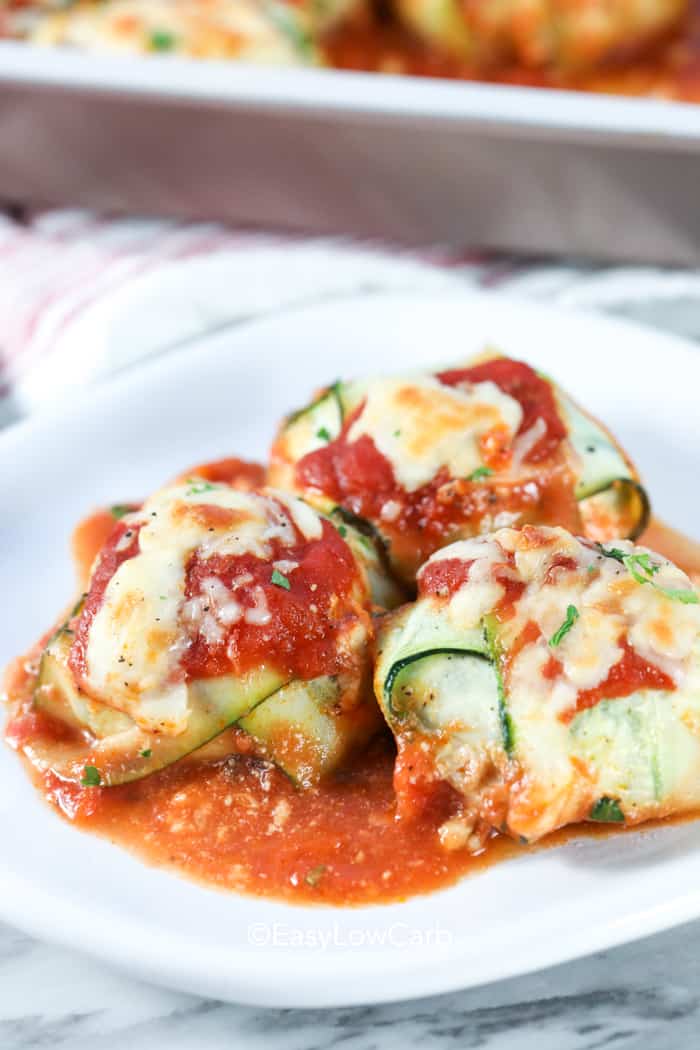 zucchini ravioli baked on a white plate