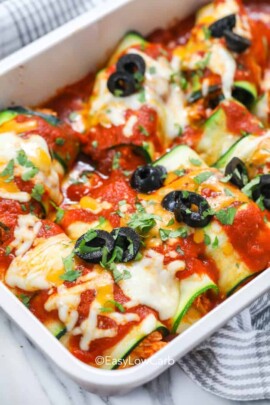 overhead of low carb Zucchini Enchiladas in a baking dish