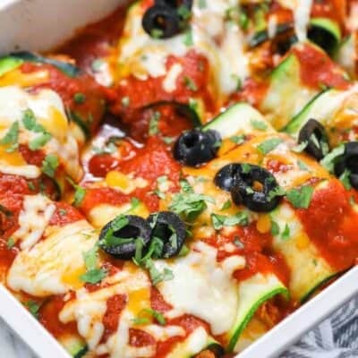overhead of low carb Zucchini Enchiladas in a baking dish