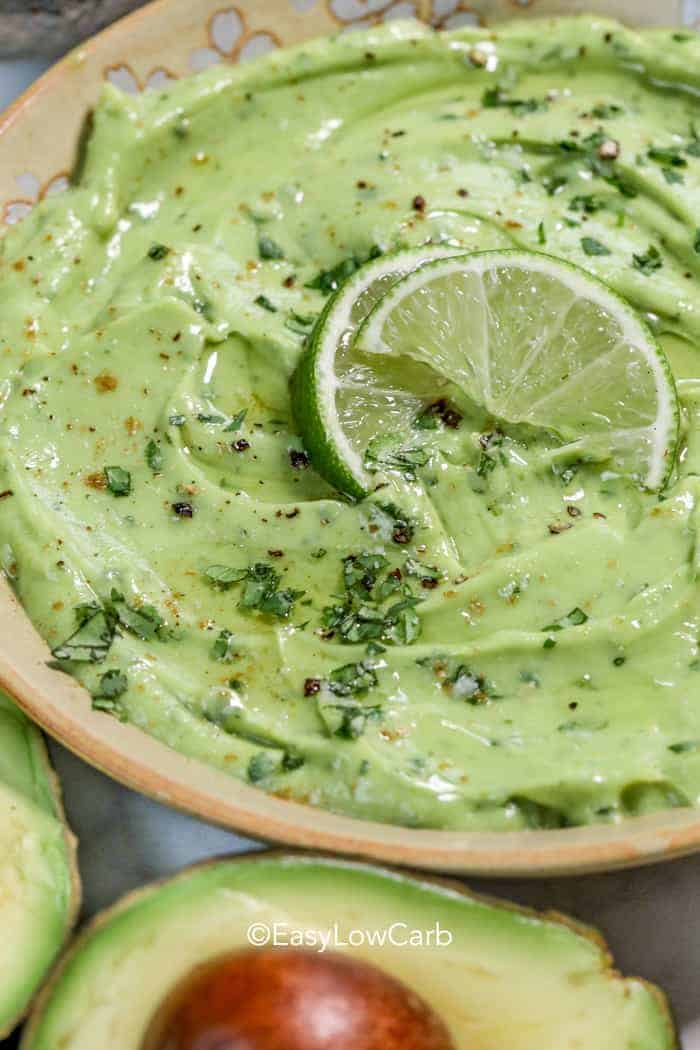 low carb avocado dip garnished with lime