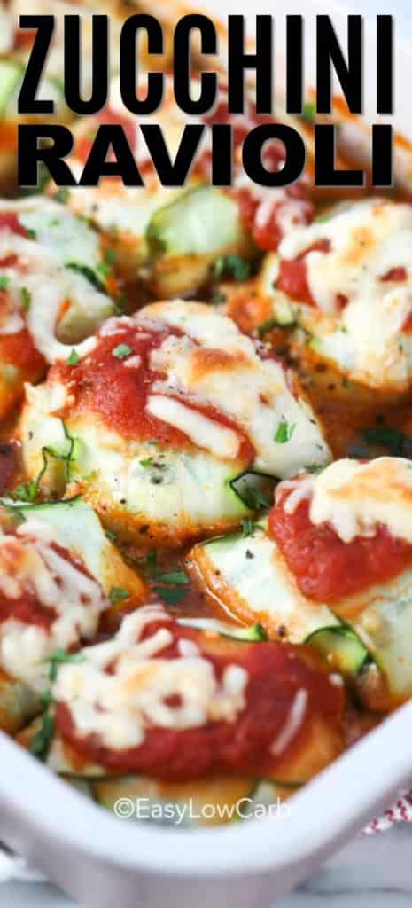 zucchini ravioli baked in a white casserole dish