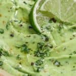 low carb avocado dip garnished with lime with text
