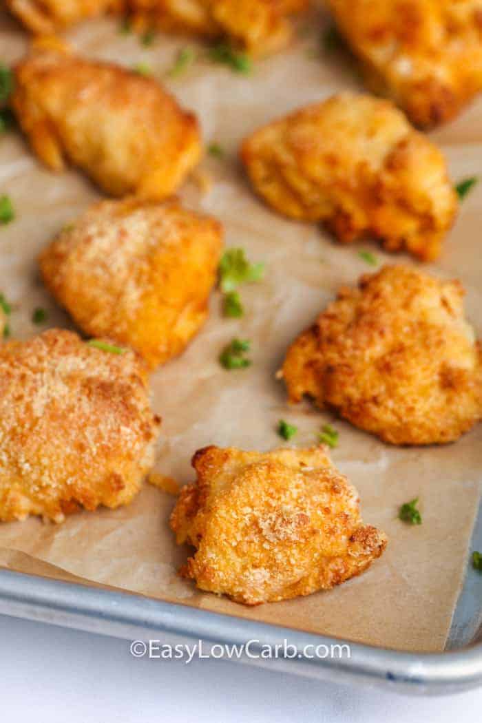 rows of buffalo chicken bites garnished with parsley