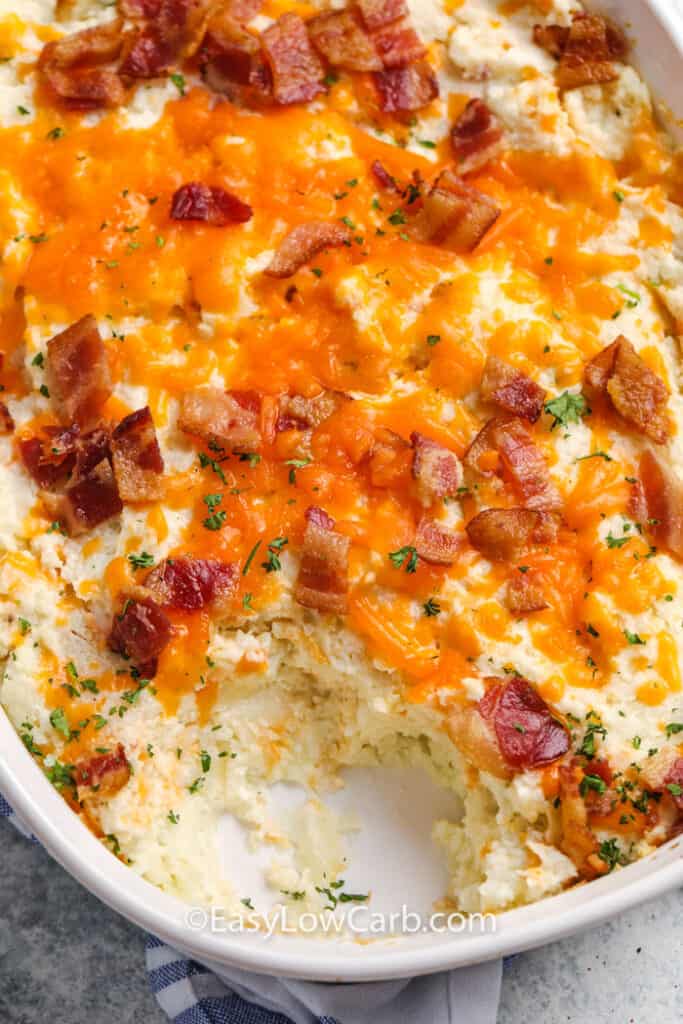 a serving of cauliflower casserole removed from the casserole dish