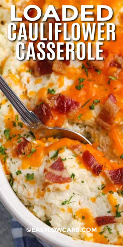 a serving of cauliflower casserole being scooped out of a casserole dish, with writing