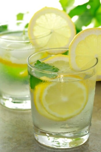 Lemon water in a glass with ice