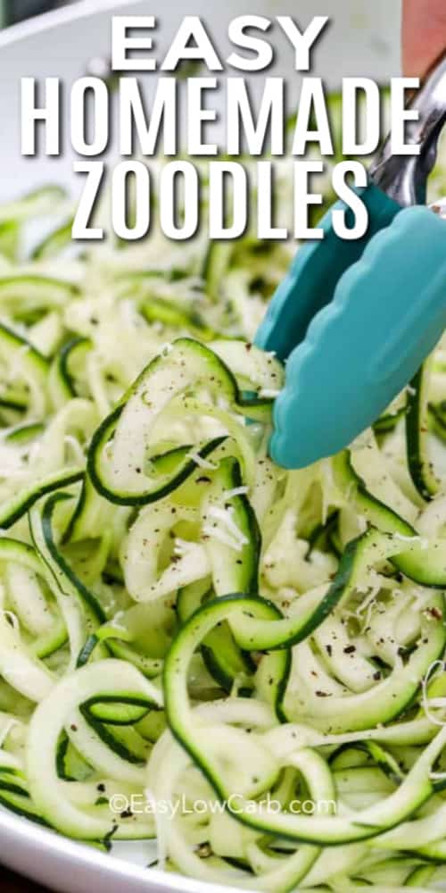 Zoodles being served with blue tongs with writing.