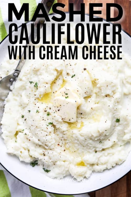 Mashed cauliflower with cream cheese and a pat of butter on top, with a title.