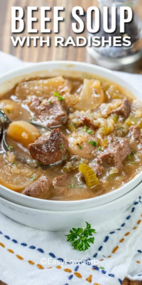 Beef Soup with Radishes in a white bowl with writing