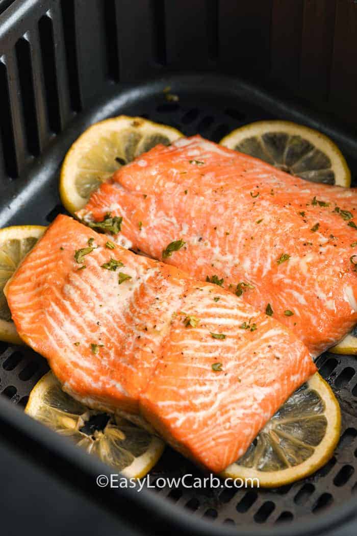 Salmon cooked in the air fryer with lemons