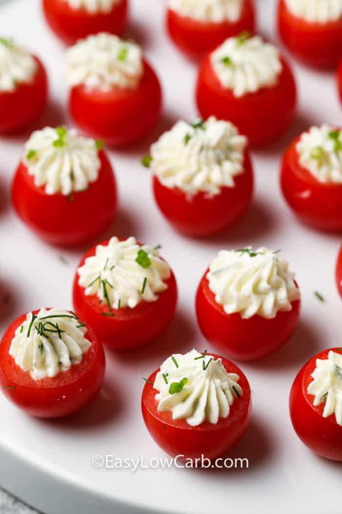 Stuffed Cherry Tomatoes on a white platter