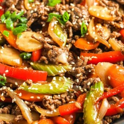 Easy Beef Stir Fry prepared in a pan, garnished with sesame seeds.
