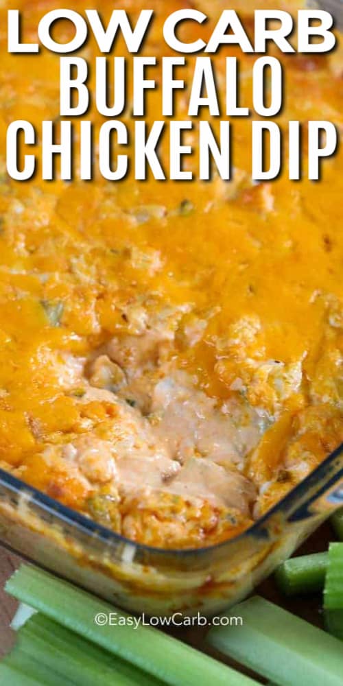 Keto Buffalo Chicken Dip in a clear glass baking dish with writing.