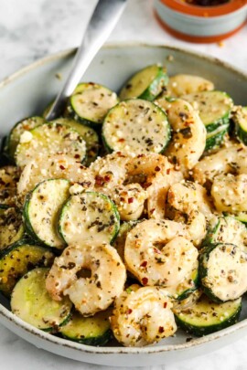 cooked Shrimp & Zucchini in a bowl with a spooon