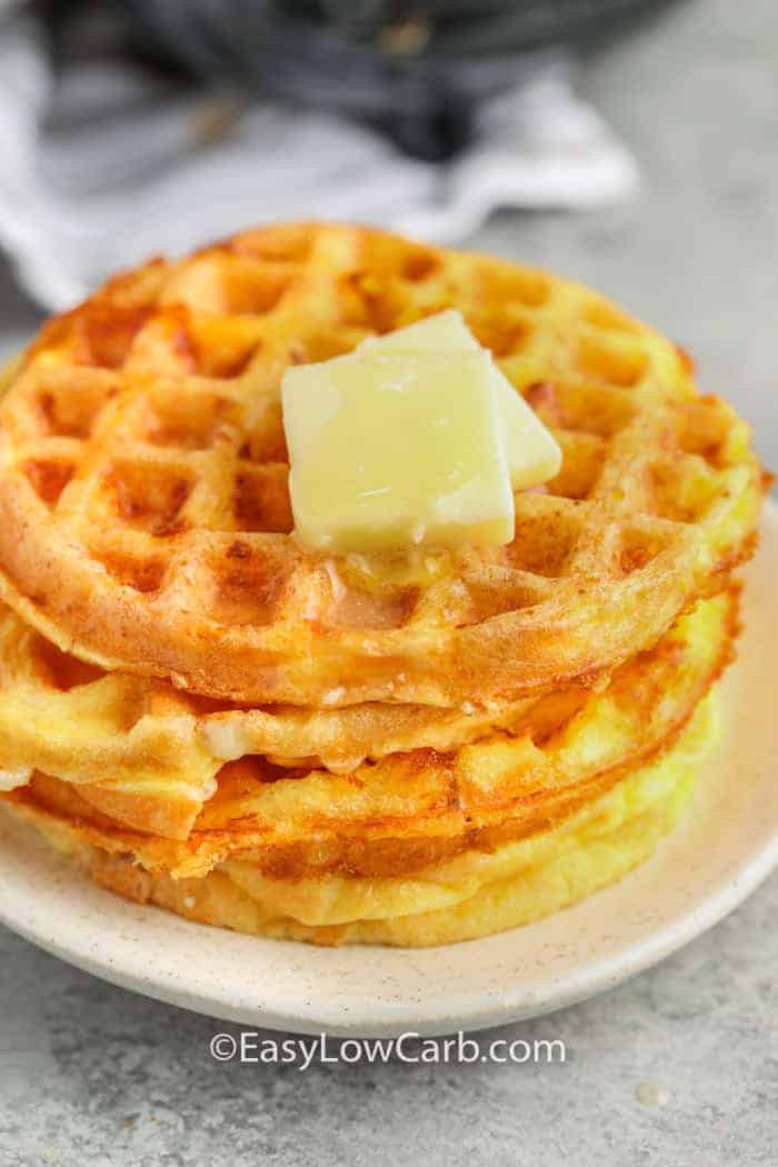 Basic Chaffle Recipe on a plate with butter on top