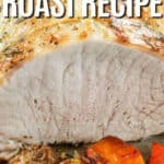Oven Roasted Pork Loin Roast on a baking sheet with vegetables and writing.