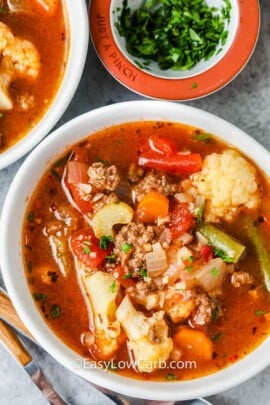 close up of Hamburger Soup in a white bowl