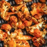 Buffalo Cauliflower Air Fryer Recipe in the air fryer with a title
